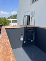 Fabrication d'une piscine container sur-mesure sur un toit terrasse près de Lyon
